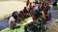 “Minggu Berkah” Berhasil Ciptakan Rasa Kekeluargaan Masyarakat Pedalaman Papua dengan SATGAS 412 KOSTRAD