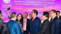 Presiden Jokowi Saksikan Penandatanganan Nota Kesepahaman Satgas Nasional Transaksi Mata Uang Lokal